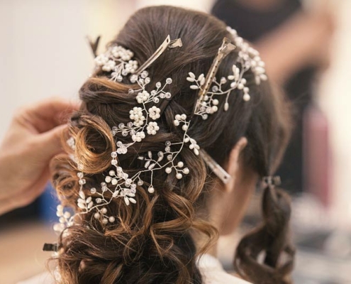 bride with long hair and hair jewelry